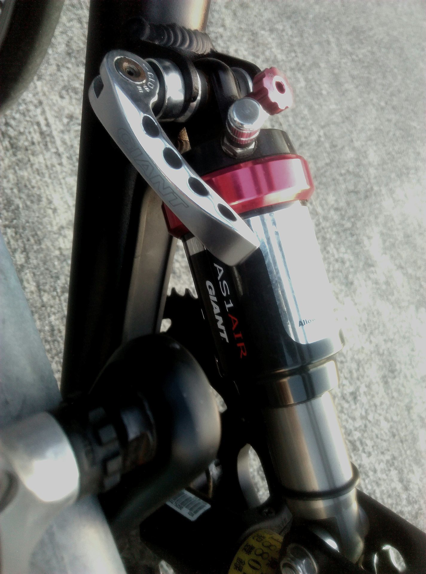 This miniature folding soft-tail road bike is a delicious